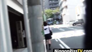 Redhead Japanese with short hair is peeing in the city