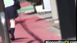 Redhead Japanese with short hair is peeing in the city