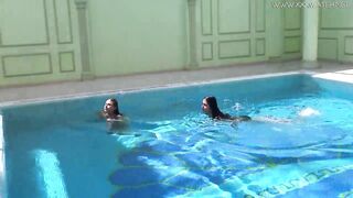 Jessica and Lindsay swim nude into the pool