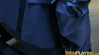 Muscular executive in a suit stuffing his cute buff employee