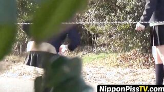 Unusual school banned search from Japan hold one another and pee outside