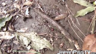 Voluptuous Japanese is pulling down her panties and peeing