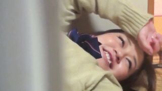 Japanese masturbates while she lays hidden on floor at home