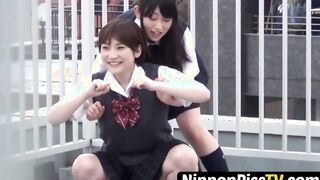 Japanese student with bushy pussy peeing outside