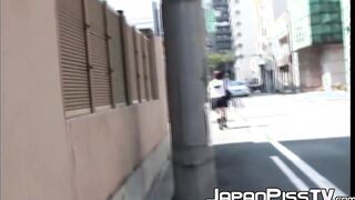 Redhead Japanese with short hair is peeing on the streets