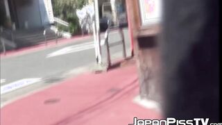 Redhead Japanese with short hair is peeing on the streets