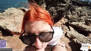 A guy fucks his red-haired girlfriend on the seashore