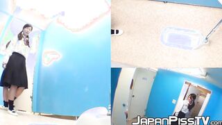Three wicked Japanese schoolgirls peeing together in toilet