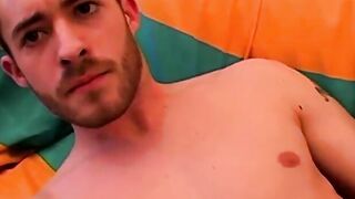 Young amateur strokes his big cock after an erotic interview