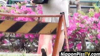 Tasteful Japanese redhead tracks down a mystery spot to pee