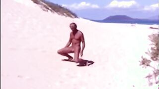 Tanned guy on beach in tiny string thong (temporarily!)