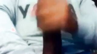 Hunk Strokes His Big Black Cock to Porn and Cums Twice