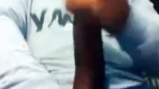 Hunk Strokes His Big Black Cock to Porn and Cums Twice