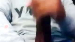 Hunk Strokes His Big Black Cock to Porn and Cums Twice