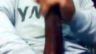 Hunk Strokes His Big Black Cock to Porn and Cums Twice