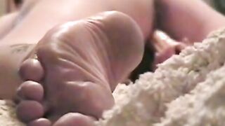 Girl Pleasures Herself with a Sex Toy from Behind