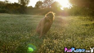 Hot medium tits babe posed in the grass