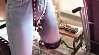 Angela dangles from the ceiling and whipped