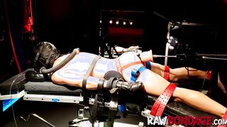 Chained jock Devin Franco lying face down being fisted in his ass