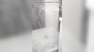 Blonde caught with a vibrator into the shower