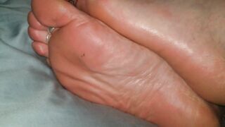 Hubby jizzes on my foot