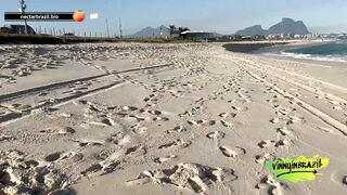 Naughty brunette seduced by porn actor on deserted beach!