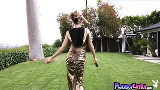 Petite blondie posing nude in the garden