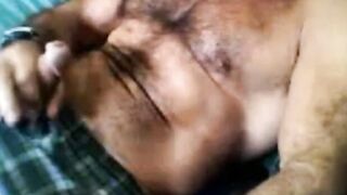 Bearded daddy strokes his cock solo