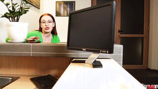 Fucking a red haired behind her working desk