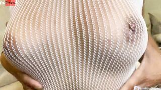 Dark Hair into a fishnet having fun with her slit