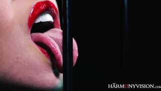 Caged rubber blonde gets a double penetration