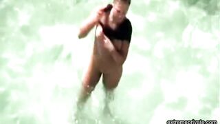 stepmother wades naked in the surf