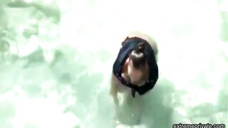 stepmother wades naked in the surf