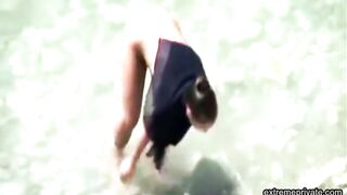 stepmother wades naked in the surf