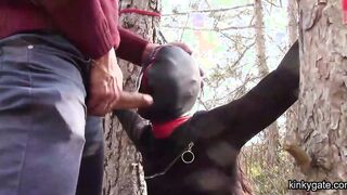 tied to a tree,  rammed in her throat