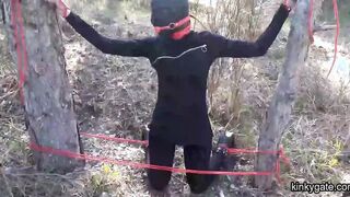 tied to a tree,  rammed in her throat
