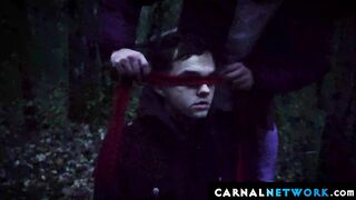 Logan Cross touched  the tip of the apprentice's penis with his tongue and knelt to a