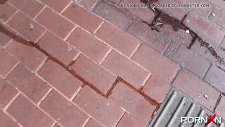 Teenie beauty peeing into her leggings outside