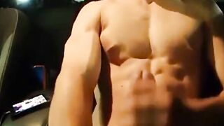 Big-Cocked Man Strokes in Car While Watching Porn