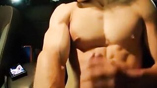 Big-Cocked Man Strokes in Car While Watching Porn