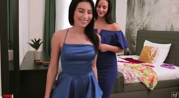Jason X is trying to work but his employees Betzz and Lilly Bella have other ideas. The girls take their time dressing 1 another into Hot underwear and Enjoying sweet caresses. Then they slip in dresses and check themselves apply makeup to each other.