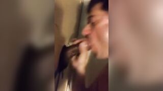 Amateur sucks big black cock at glory hole