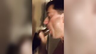 Amateur sucks big black cock at glory hole