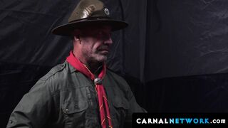 Scoutmasters Ace Banner and Adam Snow bang the two young twinks in the tent