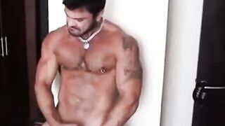 Muscle hunks stroke their big cocks and cum hard.