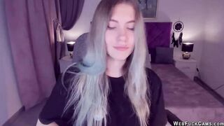Blonde teen SimaDark smoking vape and stripping off on solo webcam show