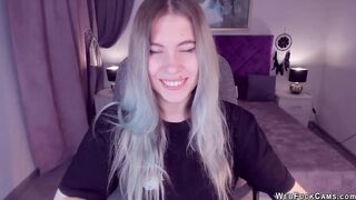 Blonde teen SimaDark smoking vape and stripping off on solo webcam show