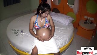 Amateur pregnant Thai slut masturbating