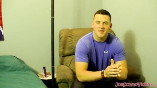 Horny muscled Kyle giving pleasure to himself by stroking his big cock on the bed