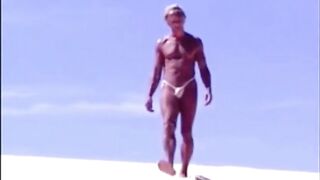 Beach Striptease: Tanned Hunk Bares All